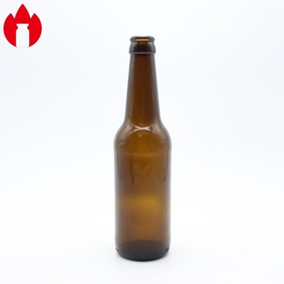 こはく色のソーダ ライム ガラスのビール瓶330mlのこはく色色
